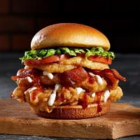 Bbq Tribeca Chicken Sandwich · Hand-dipped Chicken Breasts, Sweet Baby Ray's BBQ Sauce, Ranch, Onion Rings, Bacon, Lettuce,...