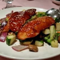 Salmon Teriyaki Dinner · Served with rice, miso soup, and salad.