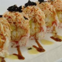 Dancing Angel Roll · Inside: shrimp tempura, mango, and avocado. Outside: spicy kani and caviar.