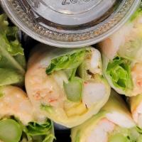 Grasshopper Roll · Inside: lobster salad, crabmeat, shrimp, mango, avocado, asparagus, lettuce wrapped in rice ...