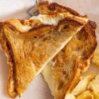 Classic Grilled Cheese · american cheese, butter on white country bread