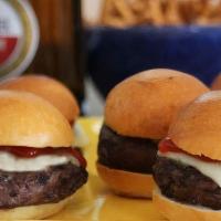 Wagyu Hamburger Sliders 1/2 Dozen · Angus beef, cheddar cheese, onions, cornichons & ketchup. . Microwave on a safe plate covere...