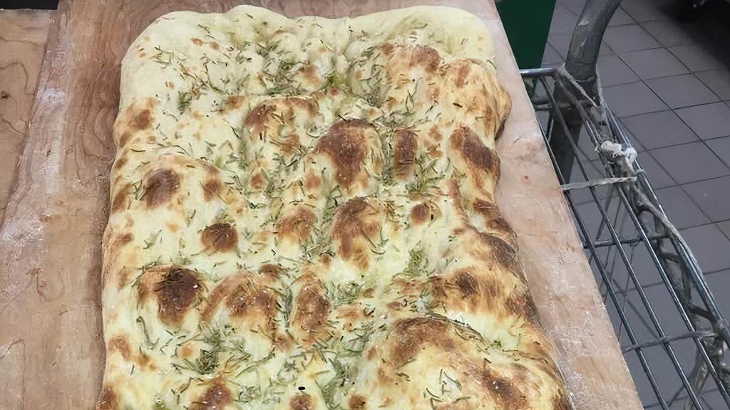 Focaccia Bianca 1/2 Tray · Our signature focaccia with rosemary and extra virgin olive oil.