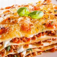 Italian Traditional Lasagna (100% Beef) · Beef bolognese, béchamel, mozzla and grana padano.