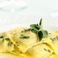 Ricotta Ravioli In Butter-Sage-Parmigiano Cheese Sauce · Fresh ricotta ravioli in butter-sage-Parmigiano cheese sauce