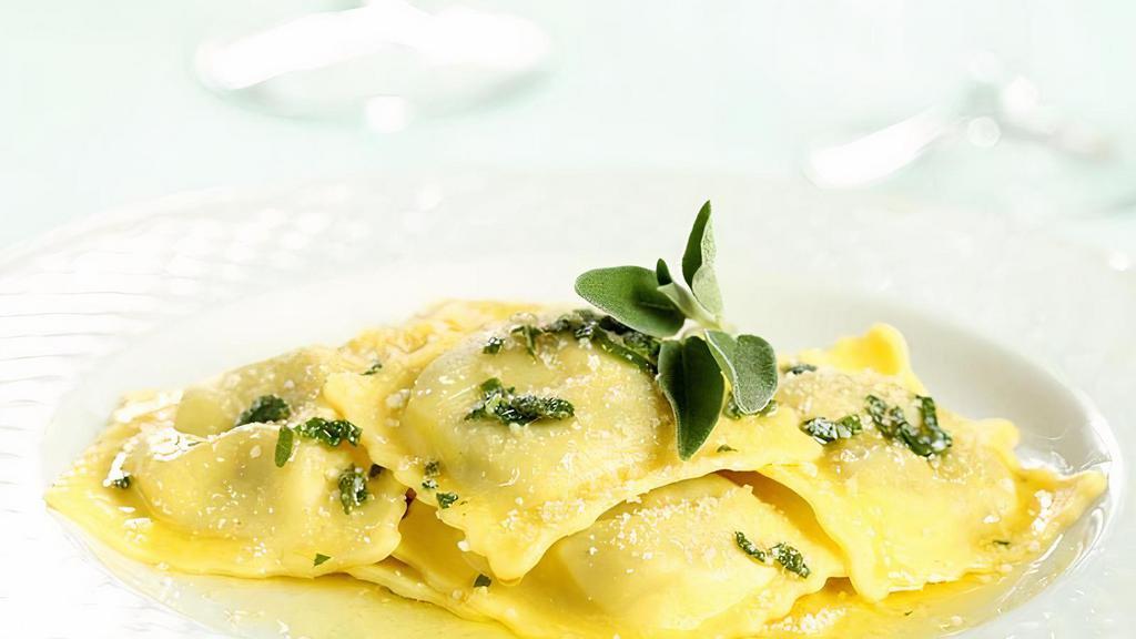 Ricotta Ravioli In Butter-Sage-Parmigiano Cheese Sauce · Fresh ricotta ravioli in butter-sage-Parmigiano cheese sauce
