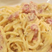 Fresh Spaghetti Alla Carbonara (Pork) · Traditional with eggs, sauteed bacon and parmigiano.