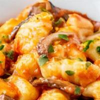 Gnocchi Di Patate Ai Funghi · Fresh potato dumpling, Italian boscaiola sauce with wild mushroom, peas, pancetta and fresh ...