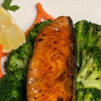 Crispy Salmon Filet (6 Oz) · Glazed with honey-garlic sauce and served with sauteed broccoli.