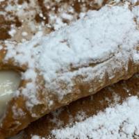 Sicilian Cannoli · Ricotta, honey and chocolate in pastry shell.