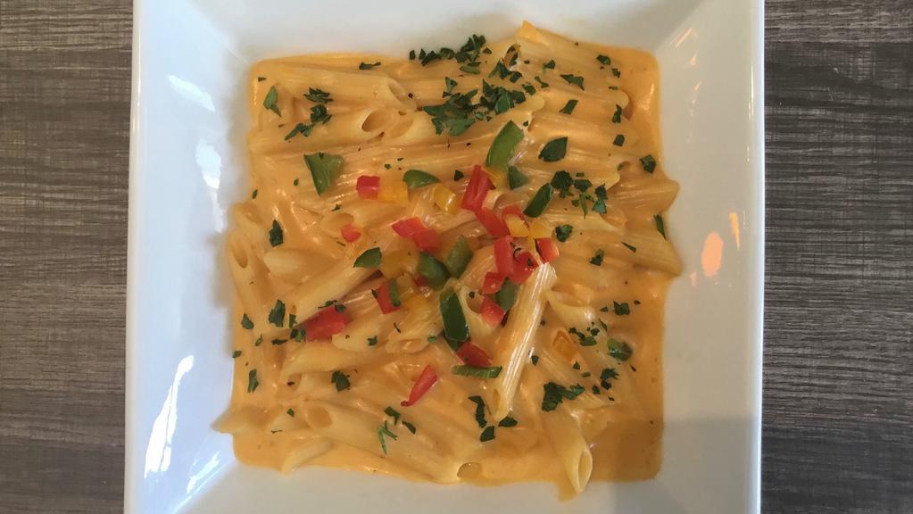 Classic Mac & Cheese · Creamy cheese sauce, noodles, topped w/ breaded breadcrumbs.