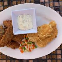 Fish& Chips · Cod fish with Wegge potatoes served with mix green salad and tartar sauce.