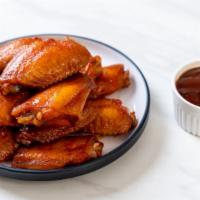 Honey Bbq Chicken Wings · Deep fried chicken wings tossed in our fresh honey BBQ sauce.