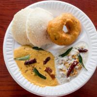 Idly Vada · Served with coconut chutney and sambhar.