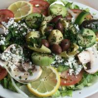 Garden Salad · Lettuce, tomato, mushrooms, pepper, cucumber, artichoke hearts, olives, parsley, and feta ch...