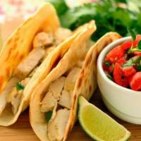 Pollo Taco · Marinated organic grilled chicken breast. Choice of Mexican-style (topped with cilantro and ...