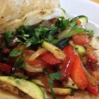 Vegetables Taco · Seasonal grilled vegetables. Choice of Mexican-style, topped with cilantro and onions or Tex...