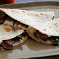 Hongos Taco · Seasoned mushrooms. Choice of Mexican-style topped with cilantro and onions or Tex-Mex style...
