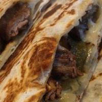 Carne Asada Quesadilla · Grilled marinated New York strip steak. Served in a 8'' flour tortilla.