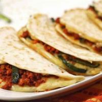 Chorizo Quesadilla · Mild spicy Mexican pork sausage. Served in a 8'' flour tortilla.