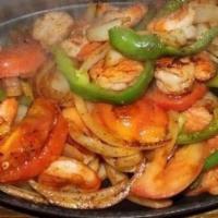 Camarones Fajita · Wild caught marinated grilled shrimps. Served with your choice of 3 soft shell corn tortilla...