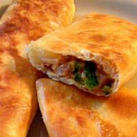Chorizo Chimichanga · Mild spicy Mexican pork sausage. Served on a fried 12