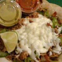 Carnitas Alambre · Homemade Mexican style 8 hours slow-cooked pork shoulder. Served with your choice of 3 soft ...