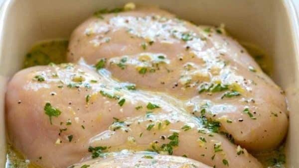 Marinated Organic Chicken Breast Side · Thyme, rosemary, lemon, garlic, olive oil.