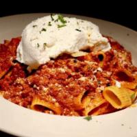 Rigatoni Bolognese · Sautéed onions and ground beef, in a creamy red tomato sauce.