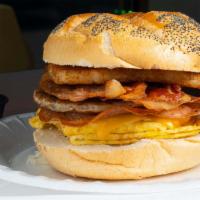 The Belly Busta Breakfast Sandwich · Egg, sausage, bacon, pork roll, hash browns and cheese.