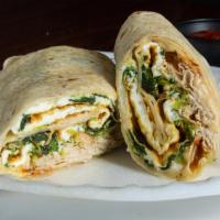 The Ironman Breakfast Sandwich · Egg white, turkey, low fat Swiss and spinach on a whole wheat wrap.