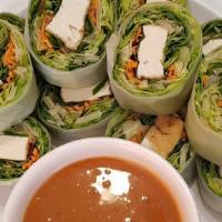 Fresh Rolls · Tofu, lettuce, carrots, and thai basil wrapped in rice paper. Served with peanut sauce.