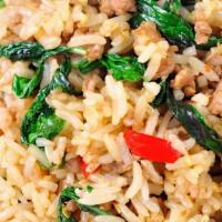 Spicy Basil Fried Rice · Medium. Stir-fried Jasmine rice, onions, bell peppers, chili, garlic, and Thai basil. Your c...