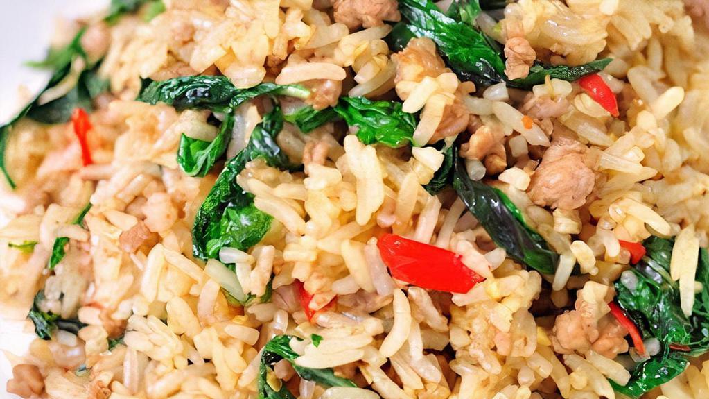 Spicy Basil Fried Rice · Medium. Stir-fried Jasmine rice, onions, bell peppers, chili, garlic, and Thai basil. Your choice of beef, chicken, pork or vegetable & fried tofu, shrimp or crispy chicken for an extra cost.