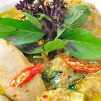Green Curry · Green curry paste cooked in coconut milk with zucchini, bamboo shoots, eggplant, bell pepper...