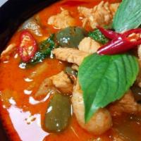 Panang Curry · Panang curry paste cooked in coconut milk with string beans and bell peppers.