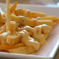 Cheese Fries · Golden French fries.