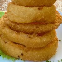 Onion Rings · Homemade crispy rings. Add fries and make it an ‘easy choice’ for an additional charge.