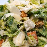 Caesar Salad · Romaine lettuce, Romano cheese, homemade croutons with our signature homemade Caesar dressin...