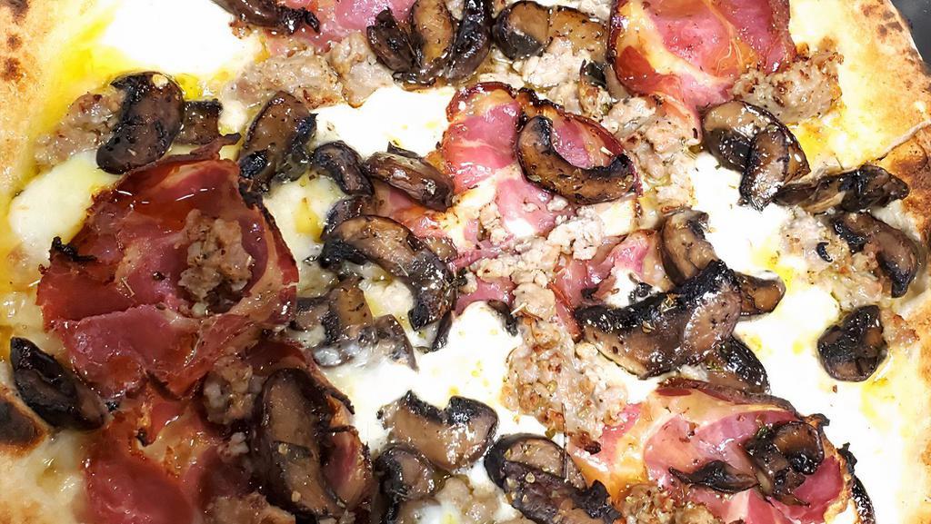 Chris Special Pizza · Fior di latte, hot coppa, sweet Italian sausage, mushroom, truffle oil and basil.