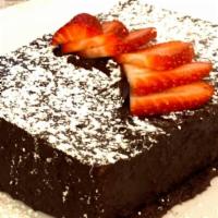 Chocolate Tort · Rich Creamy Flourless Chocolate Cake with a Hint of Coffee Liquor, Fresh Cream & Strawberrie...