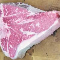 Prime Dry Aged Porterhouse · From the hip end of the short loin, this Prime Porterhouse has a full portion of the strip a...