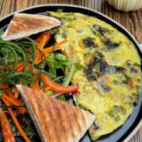 Vegetable Omelette · Omelette made with spinach, mushroom, green pepper, and onion.