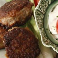 Grilled Meatballs · 3 pieces char-grilled ground lamb seasoned with unique herbs. Served with rice, roasted pepp...