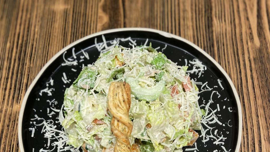 La Peri Salad · Iceberg lettuce, mixed greens, cherry tomatoes, Parmesan cheese, cucumber, roasted red pepper in olive oil, and balsamic dressing.