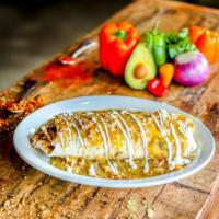 Burrito Al Pastor · Flour tortilla filled with marinated diced pork, Mexican rice, charro beans, pico de gallo, ...