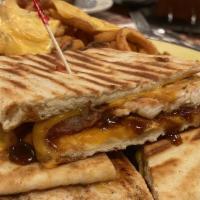 Bbq Chicken Panini · Grilled chicken Bbq sauce, and red onion with cheddar cheese and bacon. Made in a special pa...