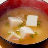Miso Soup · Soy bean soup with scallion, tofu, & seaweed.