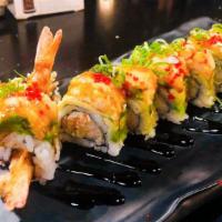 Dancing Dragon Roll · shrimp tempura spicy tuna inside. fresh tuna top with eel sauce.