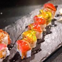 Cowboy Roll · shrimp tempura spicy crab meat inside, seared tuna avocado on top with eel sauce